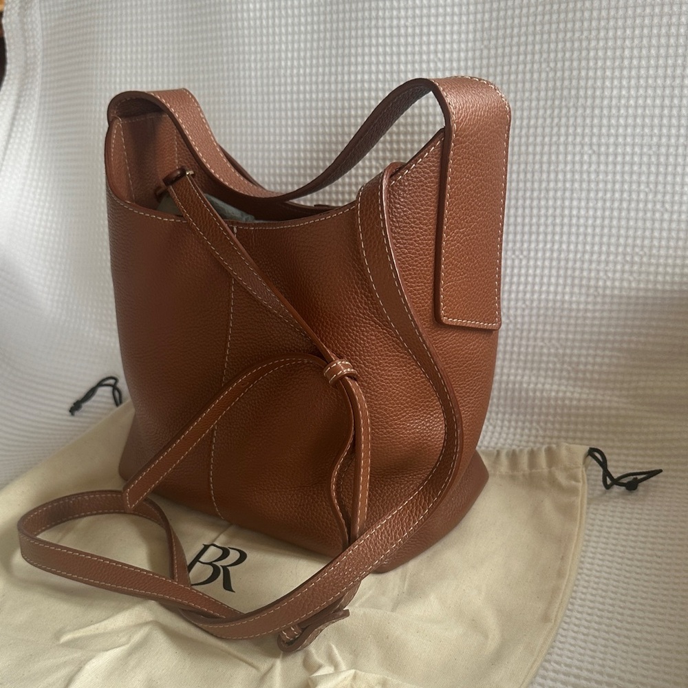 Tan leather top handle crossbody tote